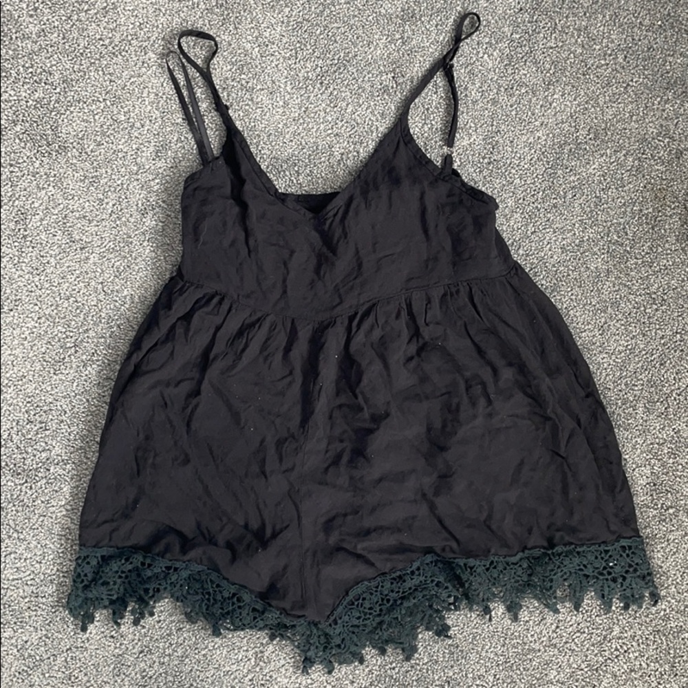 LF flowy black romper with crotchet detailing